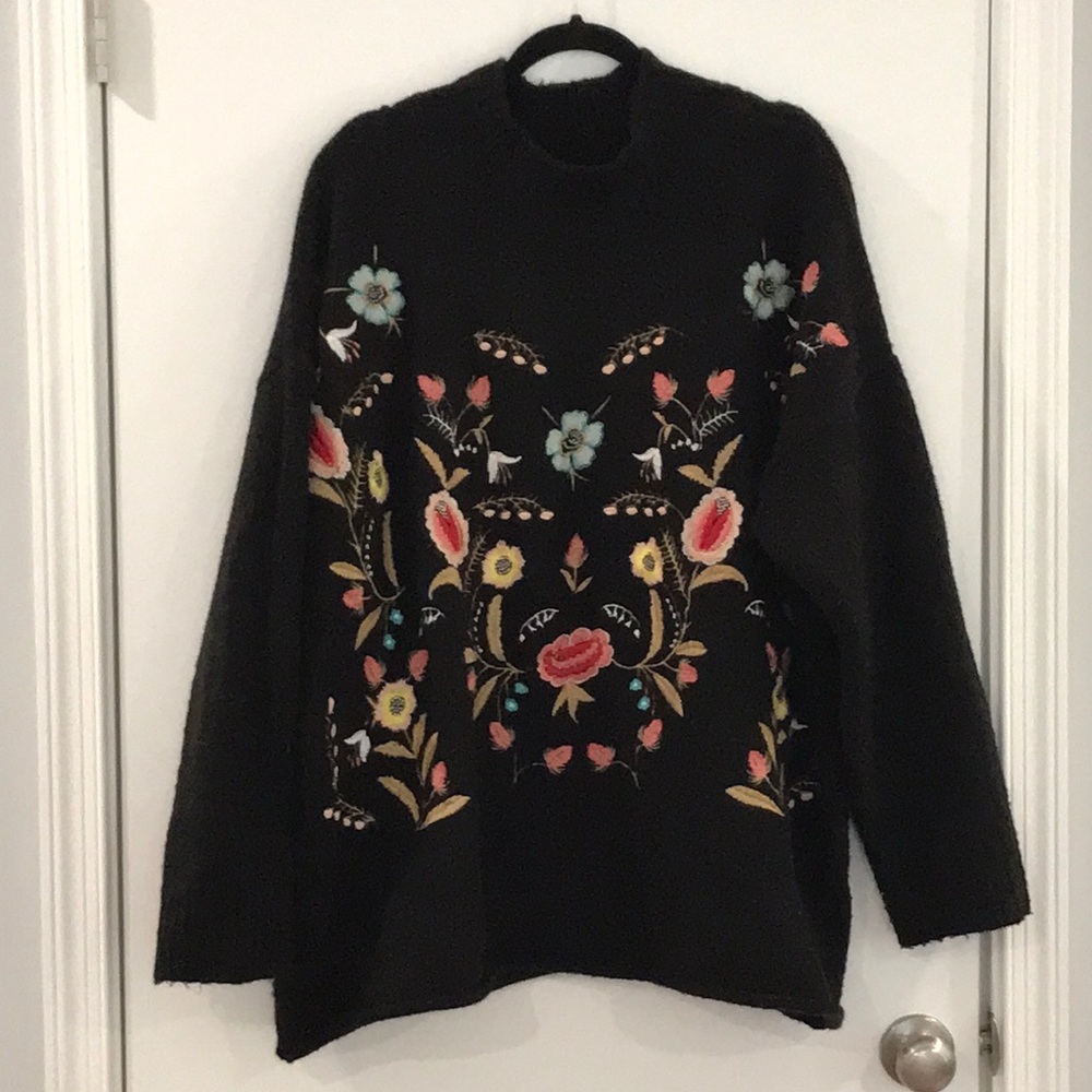 Cozy embroidered mock neck sweater